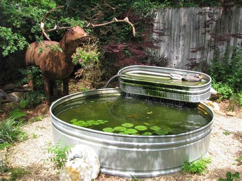 add waterfall box to metal stock tank|adding a waterfall to pond.